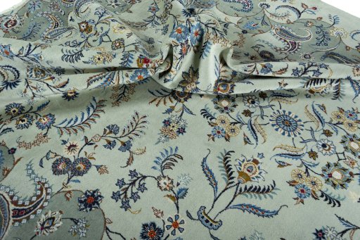Surface texture of 2000s Kashan rug with natural Wool and intricate pattern
