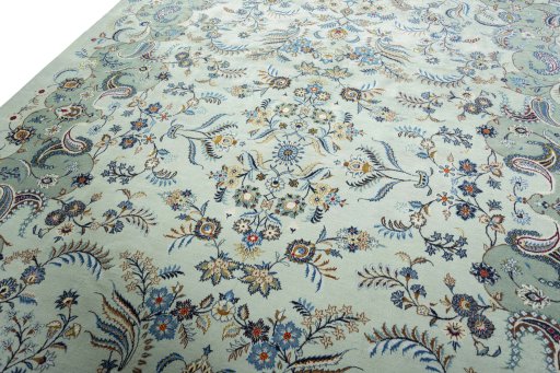 Backside of handmade 2000s Kashan rug showing knot structure and weave density