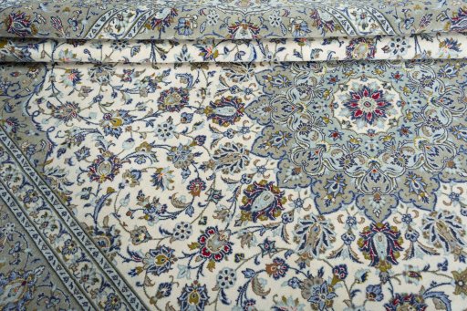 Close-up detail of 2000s Kashan rug from Iran / Persia showing Wool weave