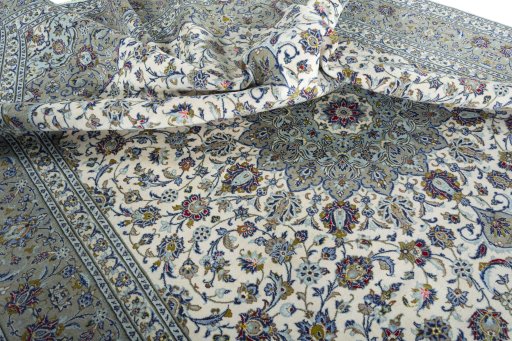 Surface texture of 2000s Kashan rug with natural Wool and intricate pattern