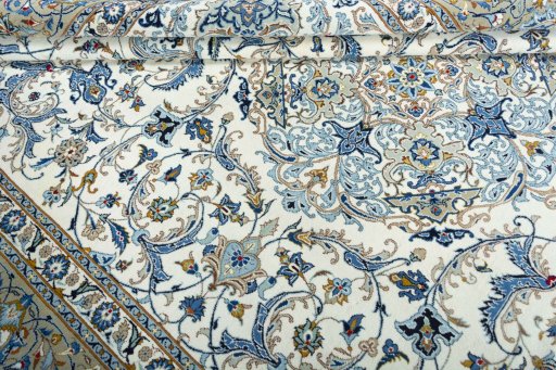 Close-up detail of 2000s Kashan rug from Iran / Persia showing Wool weave