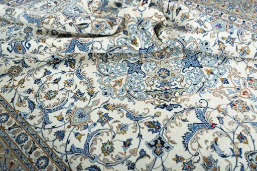 Surface texture of 2000s Kashan rug with natural Wool and intricate pattern