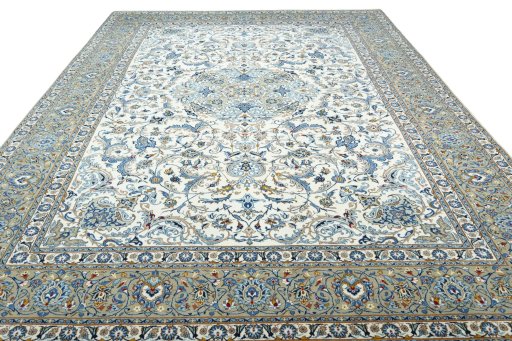 Surface texture of 2000s Kashan rug with natural Wool and intricate pattern