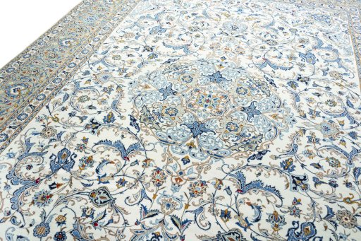 Backside of handmade 2000s Kashan rug showing knot structure and weave density