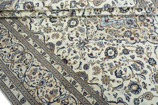 Close-up detail of 2000s Kashan rug from Iran / Persia showing Wool weave