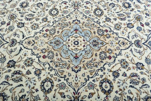 Central medallion detail of 2000s Kashan rug from Iran / Persia