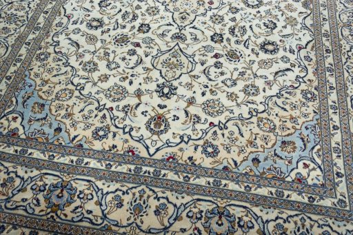 Close-up detail of 2000s Kashan rug from Iran / Persia showing Wool weave