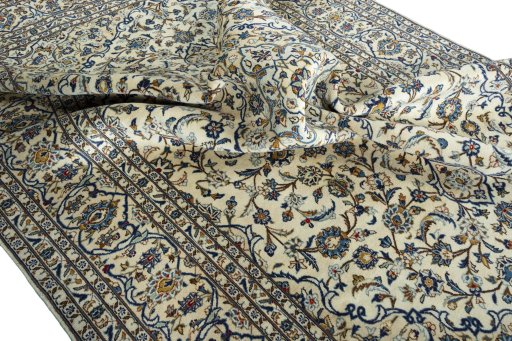 Surface texture of 2000s Kashan rug with natural Wool and intricate pattern
