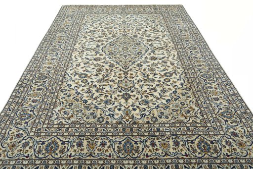 Surface texture of 2000s Kashan rug with natural Wool and intricate pattern
