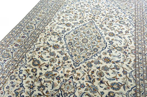 Backside of handmade 2000s Kashan rug showing knot structure and weave density