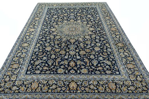 Surface texture of 2000s Kashan rug with natural Wool and intricate pattern