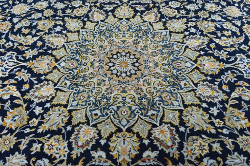 Central medallion detail of 2000s Kashan rug from Iran / Persia