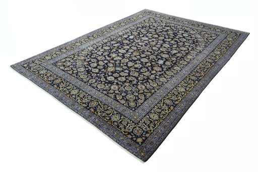 Corner detail of 2000s Kashan rug showing border pattern and Wool pile