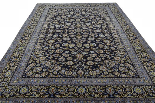 Surface texture of 2000s Kashan rug with natural Wool and intricate pattern