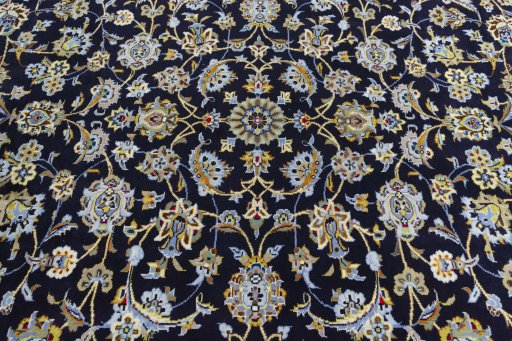 Central medallion detail of 2000s Kashan rug from Iran / Persia
