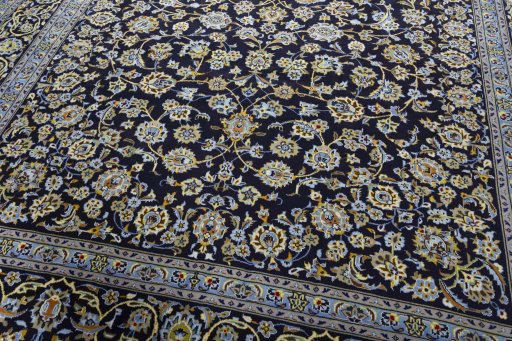 Close-up detail of 2000s Kashan rug from Iran / Persia showing Wool weave