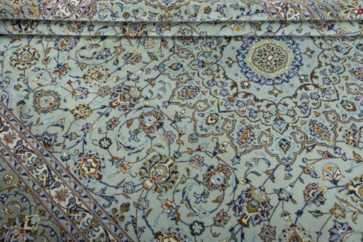 Close-up detail of 2000s Kashan rug from Iran / Persia showing Wool weave