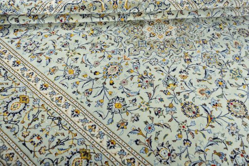 Close-up detail of 2000s Kashan rug from Iran / Persia showing Wool weave