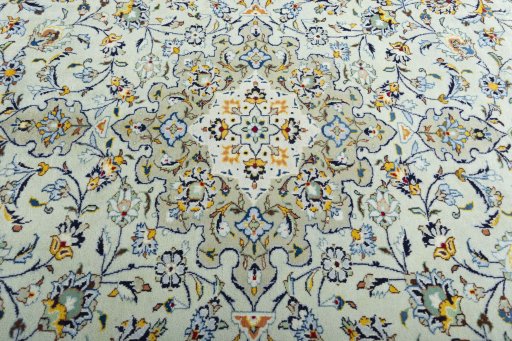 Central medallion detail of 2000s Kashan rug from Iran / Persia