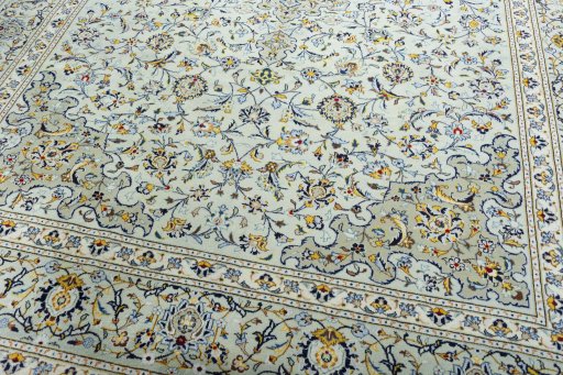 Close-up detail of 2000s Kashan rug from Iran / Persia showing Wool weave