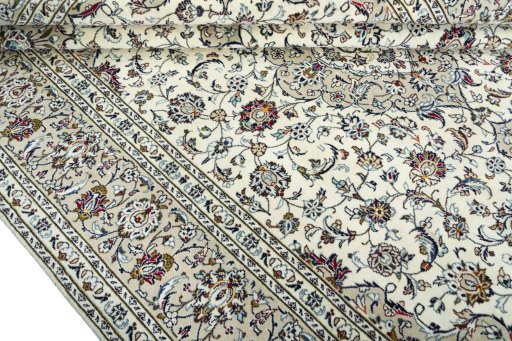Close-up detail of 2000s Kashan rug from Iran / Persia showing Wool weave