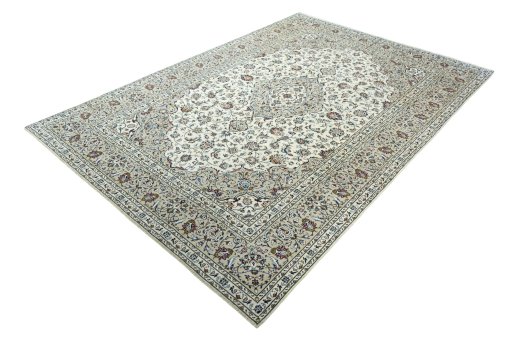 Corner detail of 2000s Kashan rug showing border pattern and Wool pile