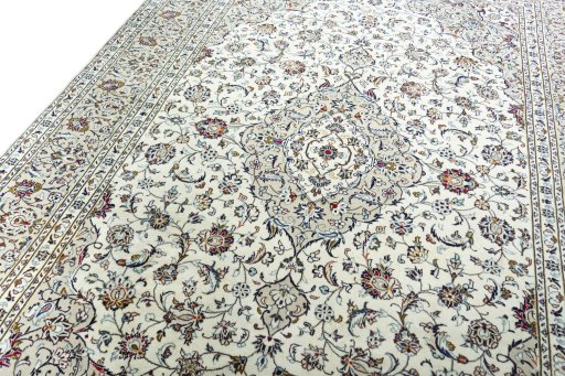 Backside of handmade 2000s Kashan rug showing knot structure and weave density