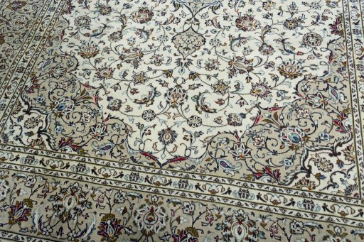 Close-up detail of 2000s Kashan rug from Iran / Persia showing Wool weave