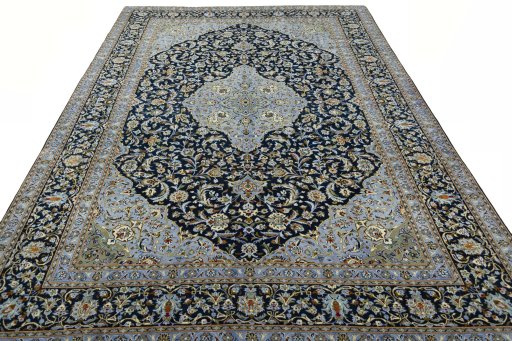Surface texture of 2000s Kashan rug with natural Wool and intricate pattern