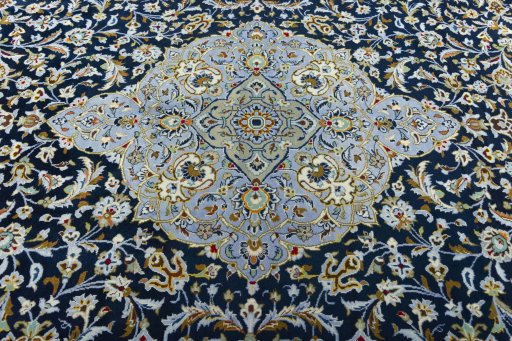 Central medallion detail of 2000s Kashan rug from Iran / Persia