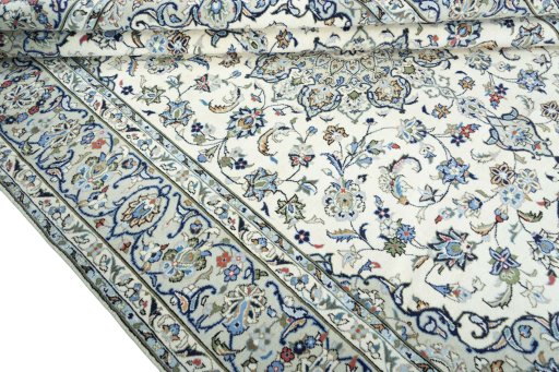Close-up detail of New Kashan rug from Iran / Persia showing Wool weave