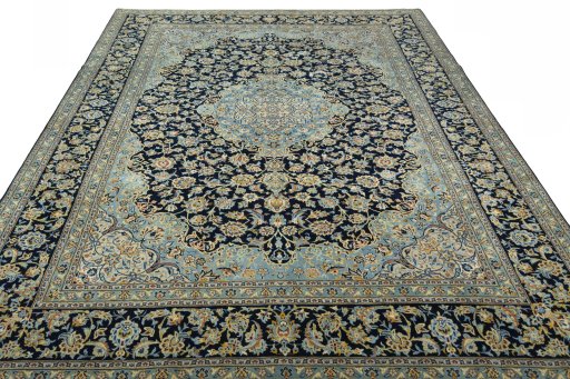 Surface texture of 2000s Kashan rug with natural Wool and intricate pattern