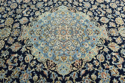 Central medallion detail of 2000s Kashan rug from Iran / Persia