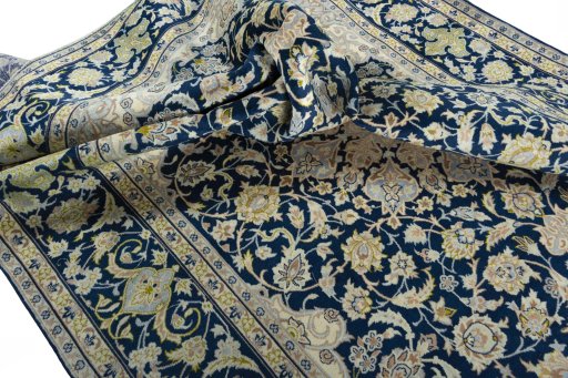 Surface texture of 2000s Kashan rug with natural Wool and intricate pattern