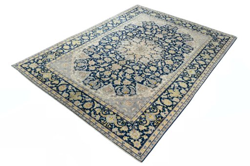 Corner detail of 2000s Kashan rug showing border pattern and Wool pile