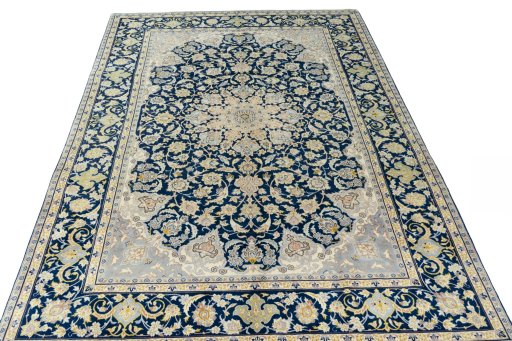 Surface texture of 2000s Kashan rug with natural Wool and intricate pattern