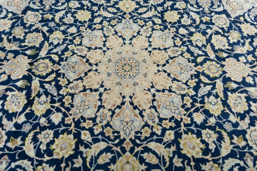 Central medallion detail of 2000s Kashan rug from Iran / Persia