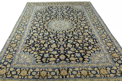 Surface texture of 2000s Kashan rug with natural Wool and intricate pattern