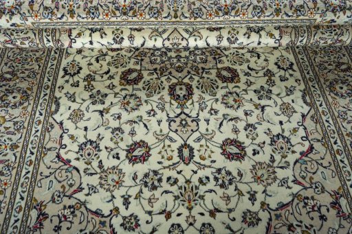 Close-up detail of 2000s Kashan rug from Iran / Persia showing Wool weave