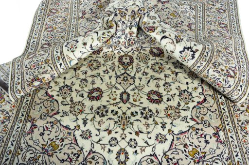 Surface texture of 2000s Kashan rug with natural Wool and intricate pattern
