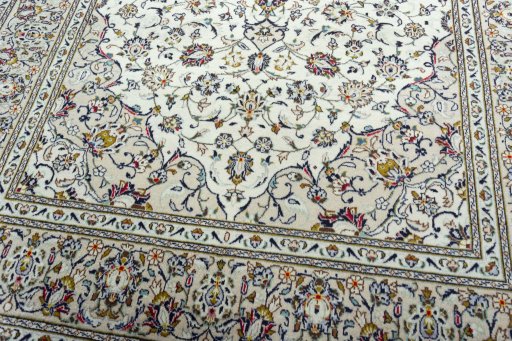 Close-up detail of 2000s Kashan rug from Iran / Persia showing Wool weave