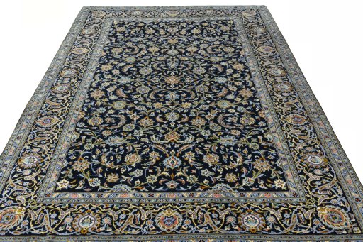 Surface texture of 2000s Kashan rug with natural Wool and intricate pattern