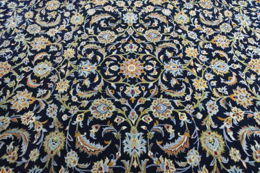 Central medallion detail of 2000s Kashan rug from Iran / Persia