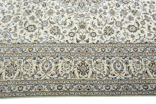 Corner detail of New Kashan rug showing border pattern and Wool pile