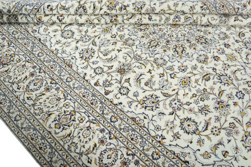 Close-up detail of New Kashan rug from Iran / Persia showing Wool weave