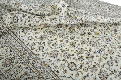 Surface texture of New Kashan rug with natural Wool and intricate pattern