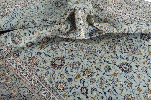 Surface texture of 2000s Kashan rug with natural Wool and intricate pattern