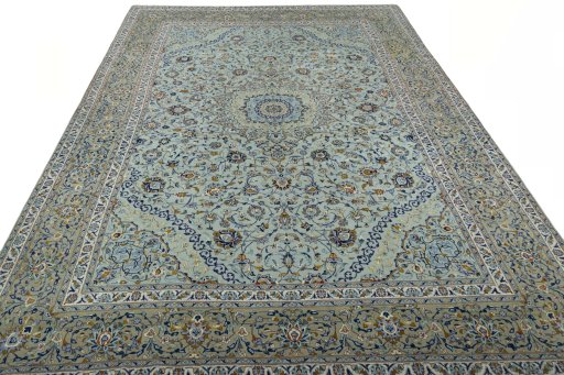 Surface texture of 2000s Kashan rug with natural Wool and intricate pattern