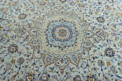 Central medallion detail of 2000s Kashan rug from Iran / Persia