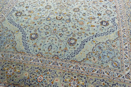 Close-up detail of 2000s Kashan rug from Iran / Persia showing Wool weave